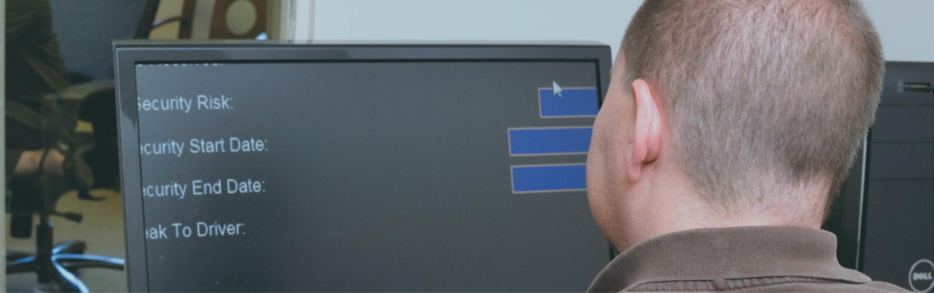  Man viewing computer using Zoom Text assistive technology